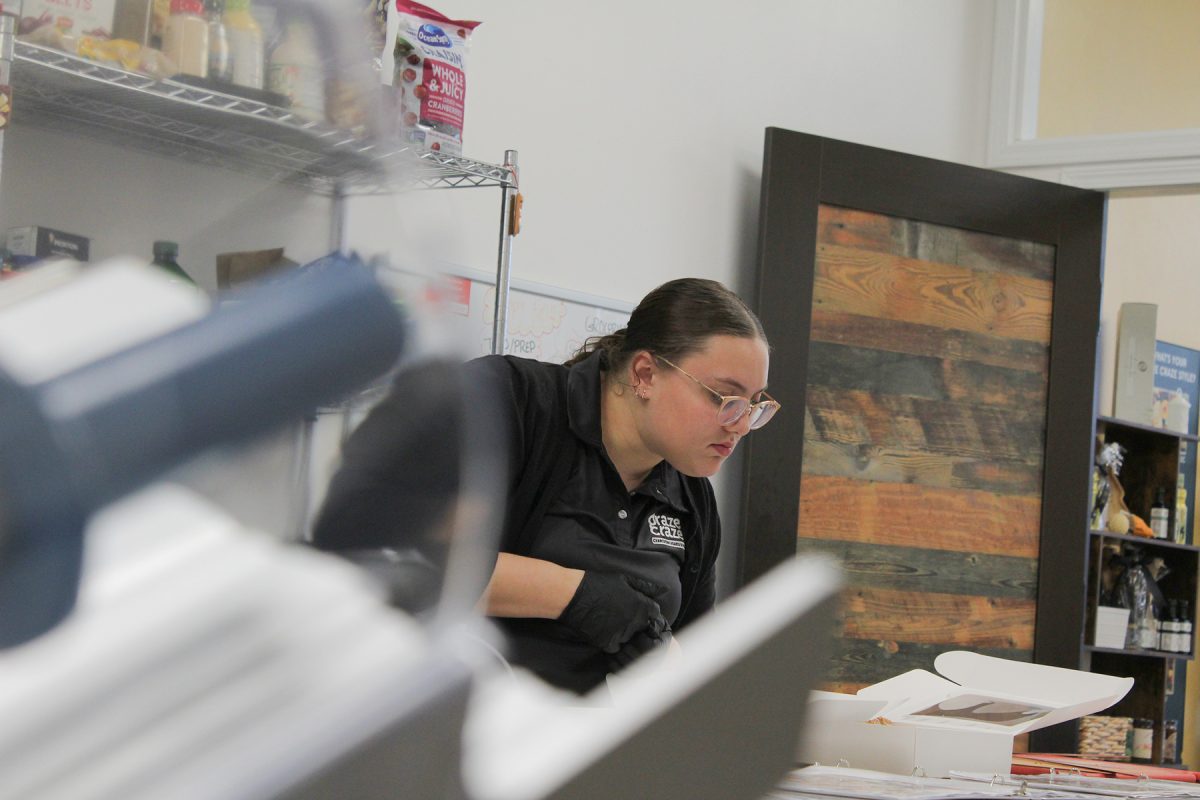 Jordan Lipinski focuses and builds a charcuterie board at Graze Craze Charcuterie Boards & Boxes in Urbandale, Iowa on Thursday, November 20, 2025.

Charlee Heffron