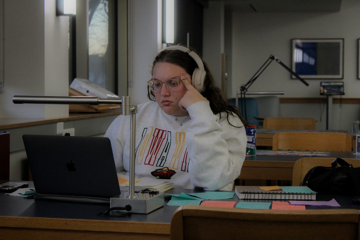 Jordan Lipinski listens to music while editing photos at the West Des Moines Public Library in West Des Moines, Iowa, on Wednesday, November 5, 2025. 

Charlee Heffron