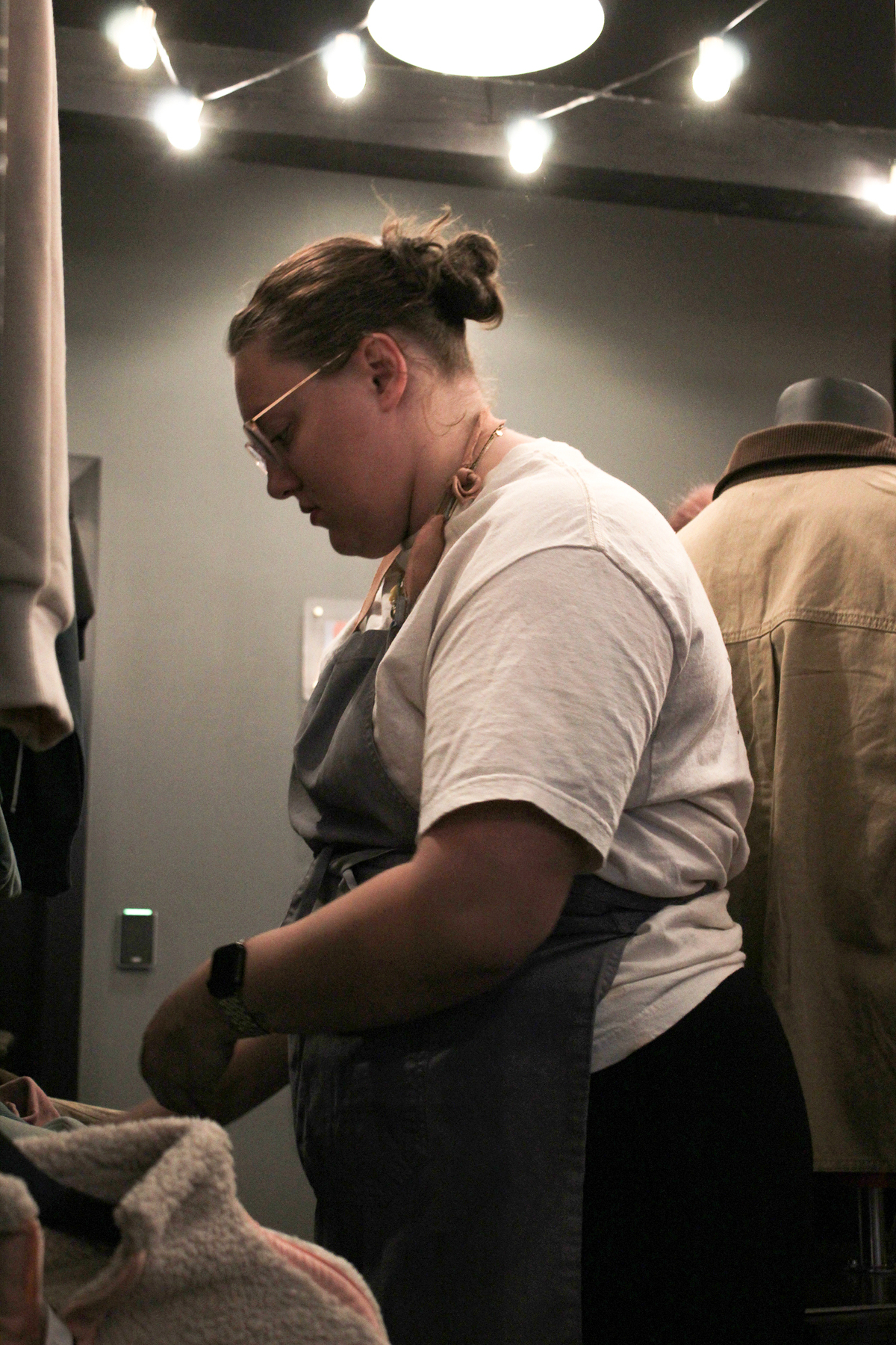 Jordan Lipinski organizes merchandise Vibrant Coffee in Des Moines, Iowa, on Thursday October 30, 2025. 

Charlee Heffron