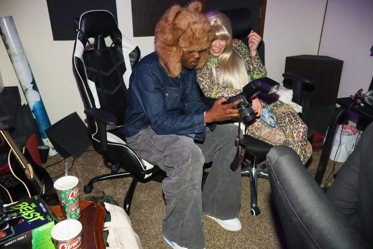 In Des Moines, Iowa at Solist’s Studio, Jordan showing incoming singer Millie the photos.
Saturday, November 21st, 2025.