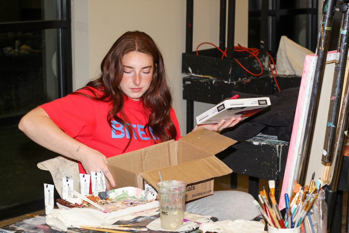 Mia Allmon grabs different paint in Rasmussen at Grand View University in Des Moines, Iowa on Thursday, November 7th, 2025. 

Sophia Soulis