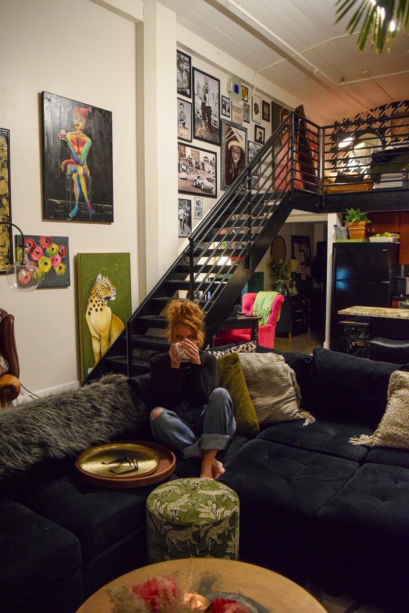 Summer Walton sits on her couch sipping on her chai tea in her downtown Des Moines loft on November 13, 2025. 
