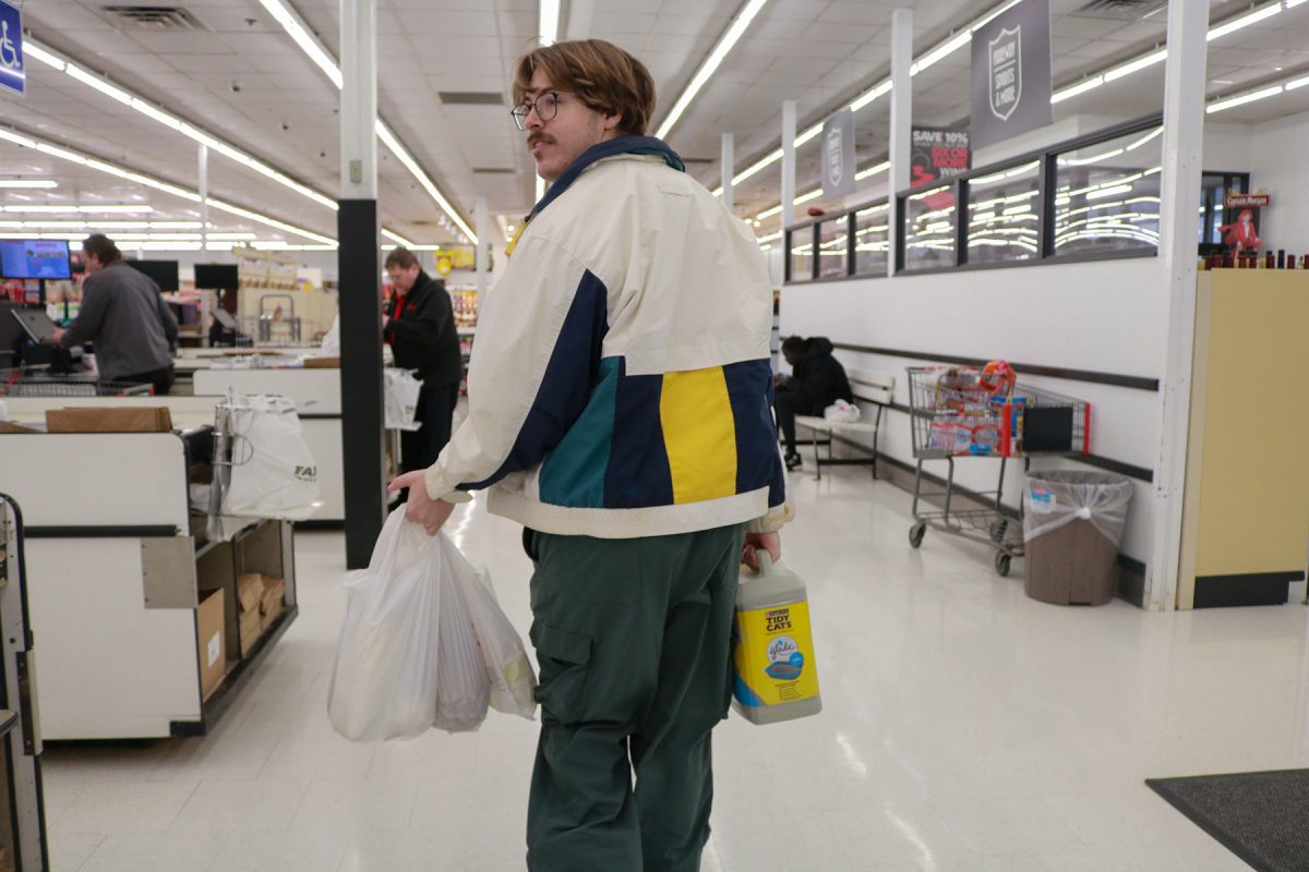 Milos Garton carries out his groceries in Fairway in Highland Park, in Highland Park, Iowa on Wednesday, November 19, 2025.
