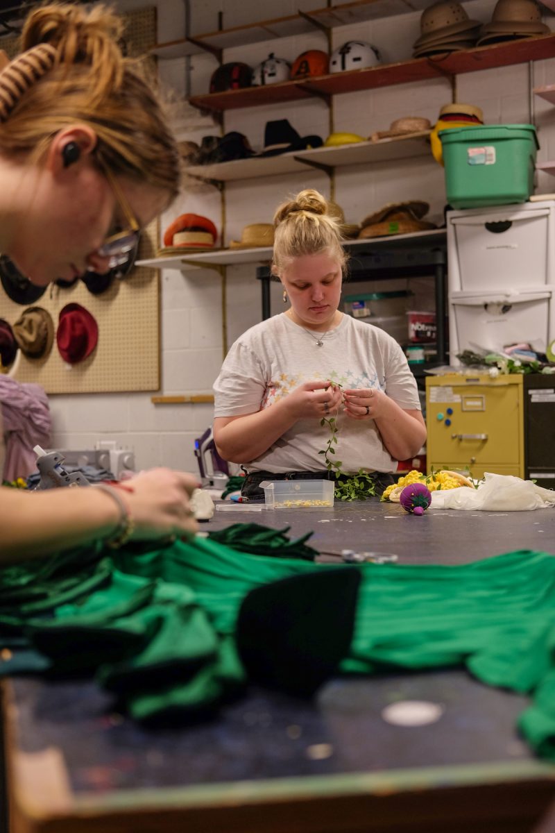 Ella Miner works on details before costume parade in preparation to perform Midsummer Night’s Dream at the Viking Theater at Grand View University on Tuesday, March 10, 2026.
Kylie Arai