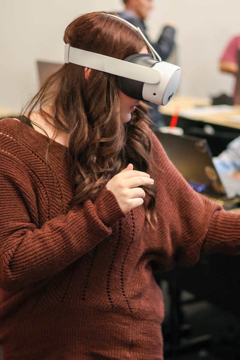 Jeriana Lipinski tests her VR game at Grand View University in Des Moines, IA on Thursday, April 2 2026